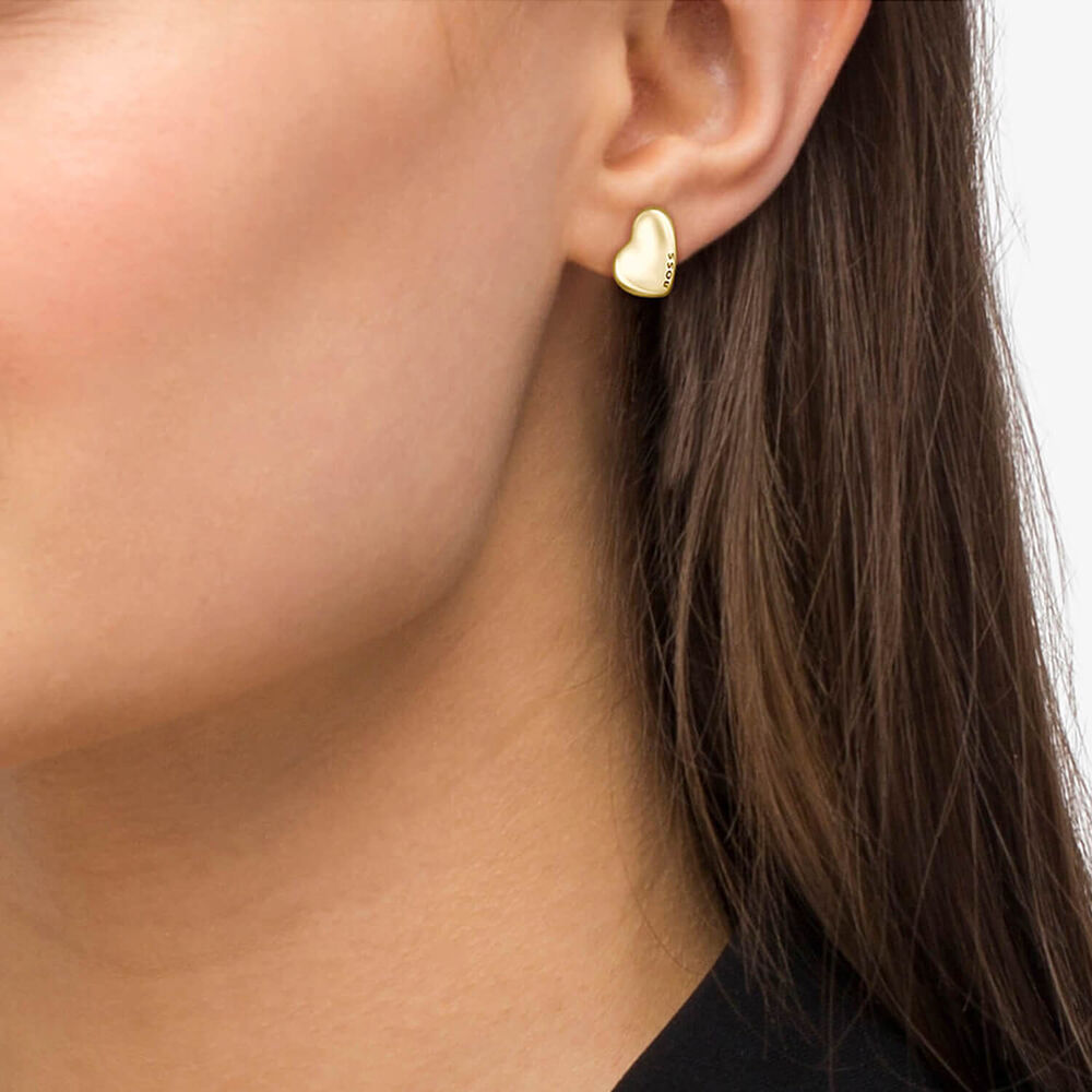 BOSS Honey Gold Toned Stainless Steel Heart Shaped Branded Stud Earrings image number 1