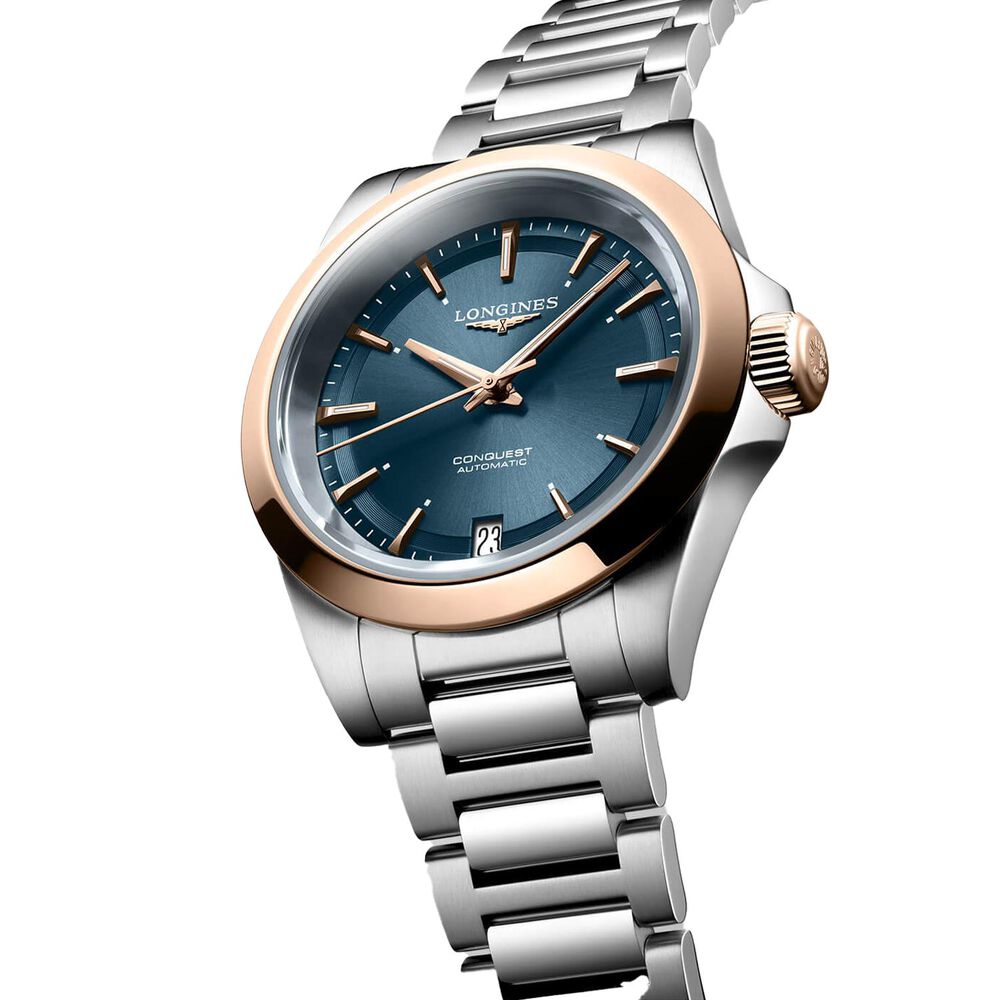 Longines Conquest 34mm Blue Dial Rose Gold Bezel Steel Bracelet Watch